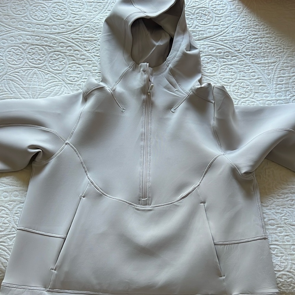 Gently used lululemon cropped sweatshirt size 2 .